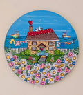 Cute little cottage by the sea circle canvas